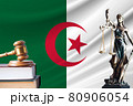 Law and justice in Algeria. Statue of themis and the gavel of the judge against the background of the flag of Algeria. Law and justice concept 80906054