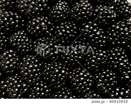 Texture background from a large number of blackberries. Natural berry background Texture background from a large number of blackberries. Natural berry background 80910839