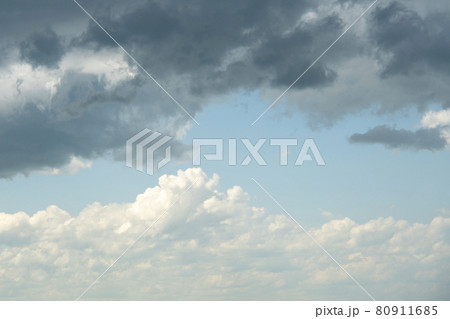 Blue sky background with stormy and white clouds. 80911685