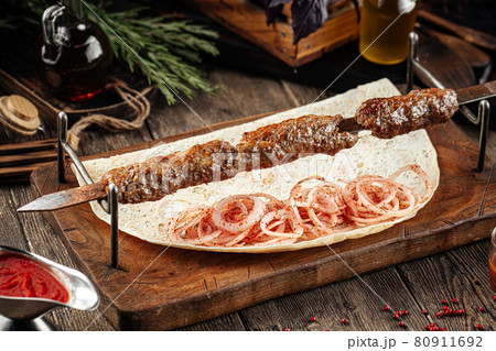 Caucasian beef lyulya kebab with marinated onion Caucasian beef lyulya kebab with marinated onion 80911692
