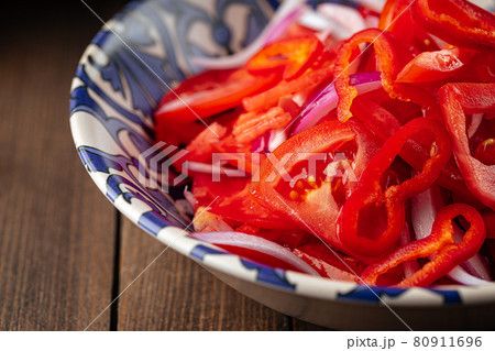 Uzbek achichuk salad with tomatoes and pepper Uzbek achichuk salad with tomatoes and pepper 80911696