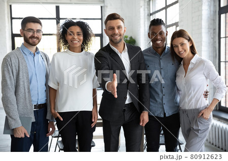 Portrait of smiling diverse businesspeople meet new employee 80912623