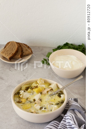 Chicken breast and sorrel soup 80912720