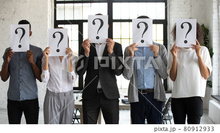 Diverse people hold paper with question mark 80912933