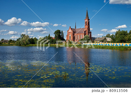 Old ancient church of St Anthony of Padua by river in Postavy, Vitebsk region, Belarus. Old ancient church of St Anthony of Padua by river in Postavy, Vitebsk region, Belarus. 80913506