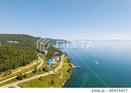 The Angara River in Siberia leaving Lake Baikal near the settlement of Listvyanka. Panoramic aerial view. The Angara River in Siberia leaving Lake Baikal near the settlement of Listvyanka. Panoramic aerial view. 80914857