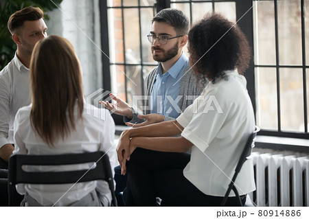 Diverse people sit in circle at mental session 80914886