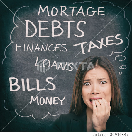 Financial stress Asian woman stressed with money problems bad credit, loans, debts, mortgage payments. Bills to pay worried person on black chalkboard with finance words written Financial stress Asian woman stressed with money problems bad credit, loans, debts, mortgage payments. Bills to pay worried person on black chalkboard with finance words written 80916347
