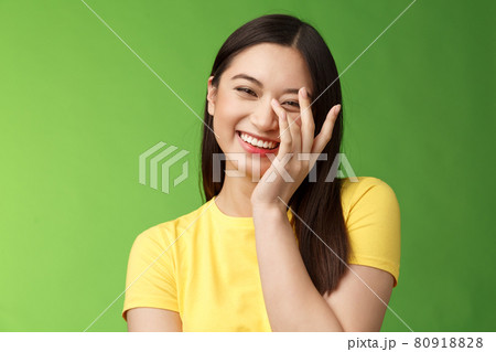 Waist-up sincere happy cheerful tender feminine asian woman brunette, laughing carefree smiling, enjoy entertaining company, giggle, touch face shy blushing cute compliments, gree background Waist-up sincere happy cheerful tender feminine asian woman brunette, laughing carefree smiling, enjoy entertaining company, giggle, touch face shy blushing cute compliments, gree background 80918828