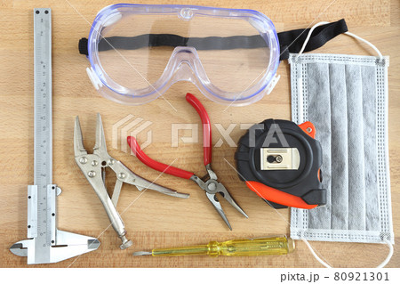 Top view of Tools equipment on wooden floor backgrounds Top view of Tools equipment on wooden floor backgrounds 80921301
