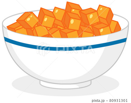 Orange candy dices in a bowl isolated 80931301