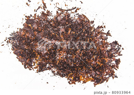 A pile of rusty, dirty old dark soot from a pan on a white background 80933964
