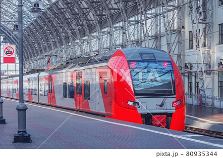 Highspeed train stands by the platform. Highspeed train stands by the platform. 80935344