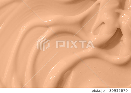 Cosmetic tonal moisturizer, bb cream swatch sample. Beige nude liquid foundation texture, concealer smear smudge drop. Make up base, cream textured background. Cosmetic tonal moisturizer, bb cream swatch sample. Beige nude liquid foundation texture, concealer smear smudge drop. Make up base, cream textured background. 80935670
