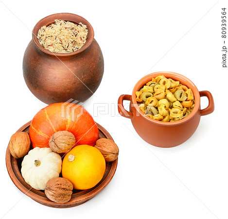 Rice, ravioli and pumpkin isolated on white background. Rice, ravioli and pumpkin isolated on white background. 80939564
