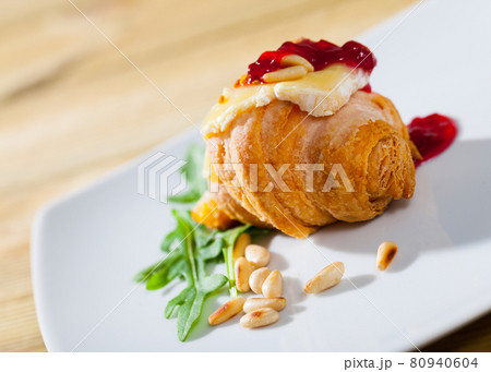 Croissant with Camembert and raspberry jam 80940604