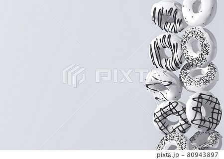 Set of flying monochrome donuts with black sprinkles on white background 80943897