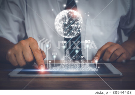 Businessman using tablet technology of global network connection of world. Management  goal strategy. hologram modern virtual screen interface. Business  Finance concept. Business intelligent (BI). 80944438