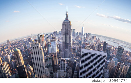 Fisheye aerial view of Manhattan in New York City, USA. Skyline panorama at sunset. Fish eye lens effect 80944774