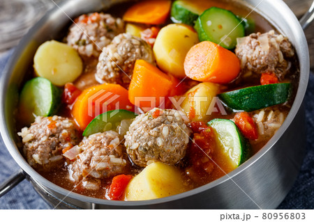 hot mexican meatball vegetable soup, top view 80956803