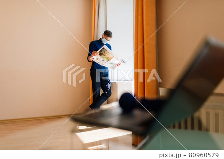 Businessman dressed in shirt having video call on computer in the home office, isolation 80960579