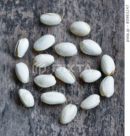 Pistachio on a wooden background Pistachio on a wooden background 80963247