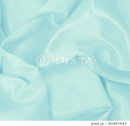 Smooth elegant blue silk or satin luxury cloth texture as abstract background. Luxurious background design 80965684