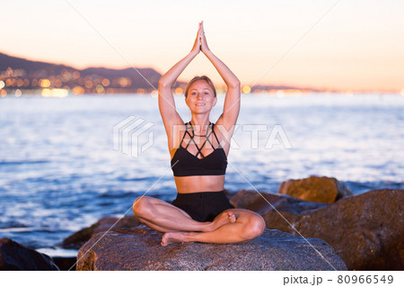 Female is meditating 80966549