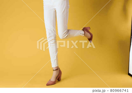female legs in shoes cropped view posing fashion summer 80966741