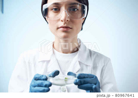 female laboratory assistant in white coat microbiology science work female laboratory assistant in white coat microbiology science work 80967641