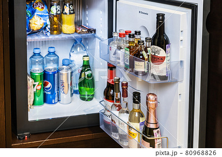 mini bar with soft drinks, vodka, wine in the hotel room mini bar with soft drinks, vodka, wine in the hotel room 80968826