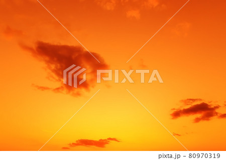Heavenly landscape dawn background sky dramatic beautiful orange red with clouds at sunset or sunrise 80970319