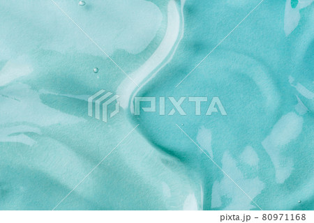 Transparent hyaluronic acid gel on a blue background. 80971168