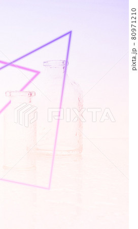 Few transparent bottles, water sprays. empty glass bottles. Vertical mobile format for smartpone stories. Few transparent bottles, water sprays. empty glass bottles. Vertical mobile format for smartpone stories. 80971210