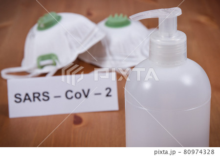Alcohol disinfectant and protective mask N95. Coronavirus protection measures Alcohol disinfectant and protective mask N95. Coronavirus protection measures 80974328