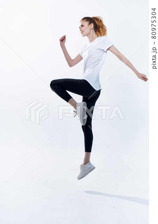 woman in sports uniform caps workout cardio exercise woman in sports uniform caps workout cardio exercise 80975304
