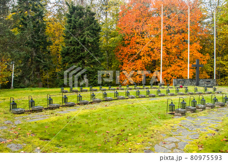 Loviisa, Finland - 8 October 2019: Row of lanterns on the graves of war heroes on the cemetery of Ruotsinpyhtaa Loviisa, Finland - 8 October 2019: Row of lanterns on the graves of war heroes on the cemetery of Ruotsinpyhtaa 80975593