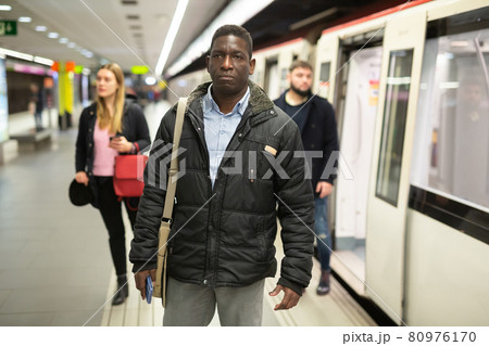 African American waiting for subway train 80976170