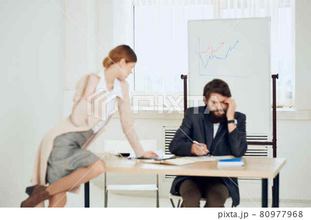 work colleagues desktop office communication officials 80977968
