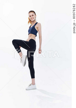 sportive woman exercise jumping cardio workout lifestyle 80978282
