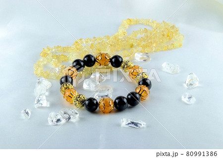 ブラックオニキス、シトリン、ロンデルの天然石ブレスレット 80991386