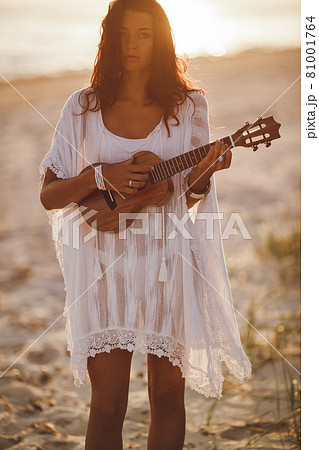 Musician Woman with Ukulele on the Beach Summer Vacation Musician Woman with Ukulele on the Beach Summer Vacation 81001764