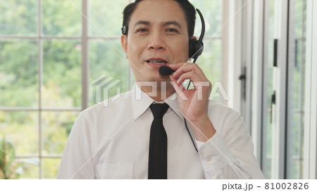 Video call camera view of businessman talks actively in videoconference Video call camera view of businessman talks actively in videoconference 81002826