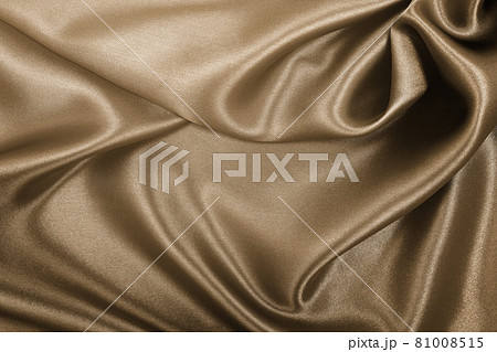 Smooth elegant brown silk or satin texture as abstract background. Luxurious background design. In Sepia toned. Retro style 81008515