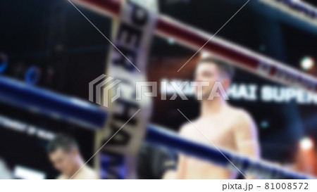 Thai Kick boxing. Blurred images of Muay Thai. Martial Art Kickboxing. Local and foriegn boxer are fighting on the ring at stadium stage. Muaythai is sport competition for traveller sightseeing. Thai Kick boxing. Blurred images of Muay Thai. Martial Art Kickboxing. Local and foriegn boxer are fighting on the ring at stadium stage. Muaythai is sport competition for traveller sightseeing. 81008572