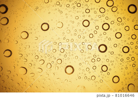 Yellow water droplets background. 81016646