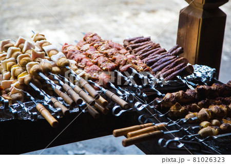 Meat and potatoes prepared for frying on skewers. Meat and potatoes prepared for frying on skewers. 81026323