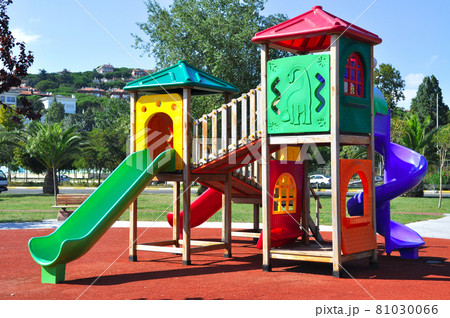 Colorful playground and equipment in public safe park Colorful playground and equipment in public safe park 81030066