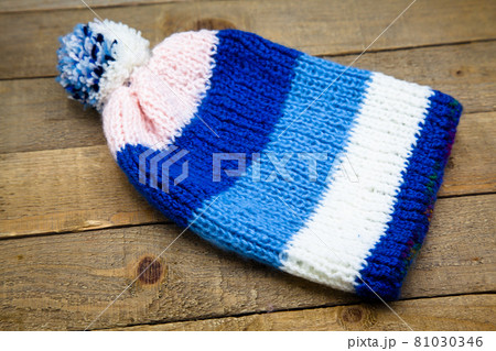 Handmade wool knitted winter blue and white hat Handmade wool knitted winter blue and white hat 81030346