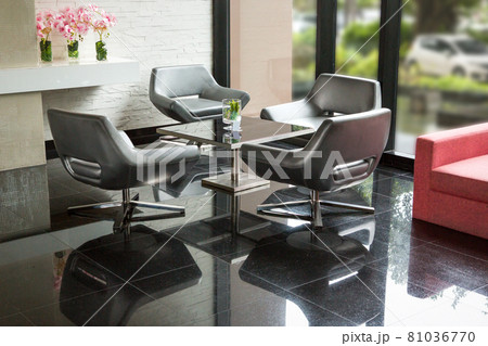Table and chair set for relaxing in the hotel 81036770
